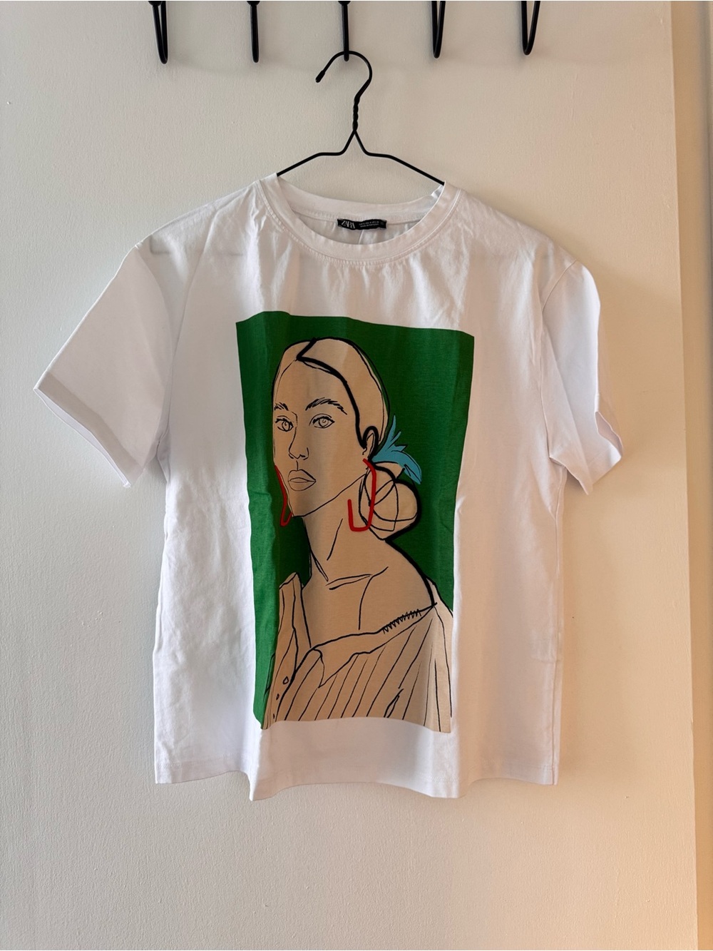 Zara White Tee with Green Panel and Red Accent